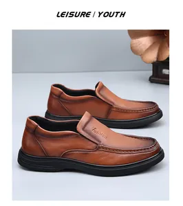 Detailed view of premium brown cowhide leather men's loafers with embossed fashion logo