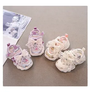 Detailed view of girls' mesh sports sandals featuring elegant lace bows in various colors
