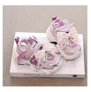 Pink girls' mesh sports sandals with elegant lace pearl bow detail and soft sole