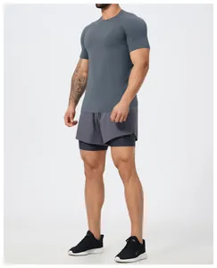 Detailed view of men's gray seamless muscle fit compression T-shirt for gym