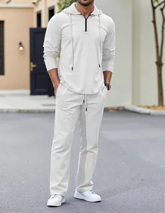Full-body view of men's white linen leisure set with hooded half-zip top and long pants