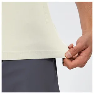 Close-up of men's quick-dry sports t-shirt showing seamless hem and breathable texture