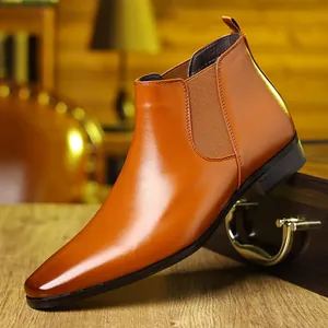 Elegante bruine lederen Chelsea boot zijprofiel met puntige neus in klassieke stijl