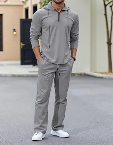 Men's grey linen casual set featuring a hooded half-zip top and matching pants