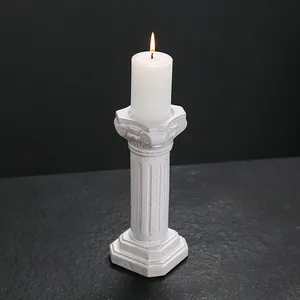 Elegant white ceramic Roman column candle holder for atmospheric dinner table decor