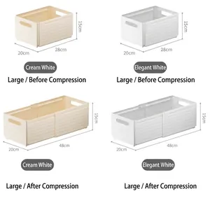 Large white telescopic desk organizer box showing expandable length from 28 to 48cm