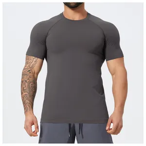 Detailed macro view of men's seamless charcoal gray quick-dry athletic slim fit T-shirt