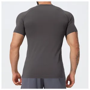Back view of a men's charcoal gray seamless quick-dry breathable slim fit athletic t-shirt.