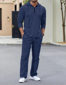 Full view of men's navy blue textured hooded set with zipper and drawstring detail.