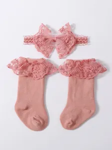 Conjunto de diadema con lazo de encaje rosa y calcetines altos con volantes para bebés