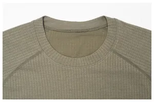 Detail shot of the crew neckline on a men's olive green quick-dry breathable sport t-shirt
