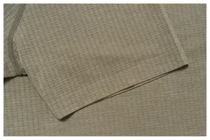 Macro detail of olive green seamless sports t-shirt showing breathable fabric texture