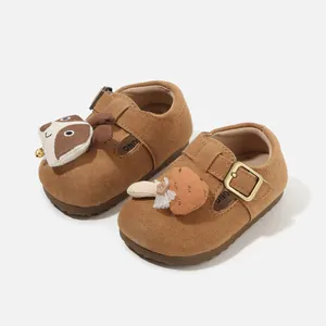 Brown suede toddler walking shoes featuring cute raccoon and mushroom decorative patches