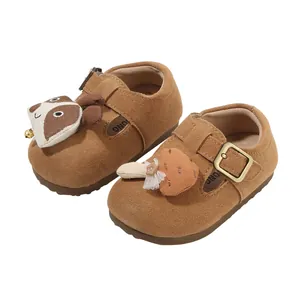 Cute brown suede baby walking shoes with animal patches and soft soles for toddlers