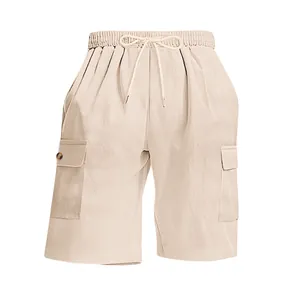 Detail of beige corduroy cargo shorts showing the drawstring waist and large side pockets