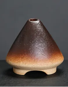 Rustic cone-shaped ceramic Palo Santo burner with brown gradient glaze and fireproof design
