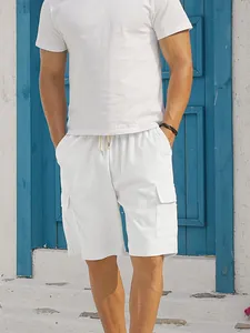 Detailed macro view of white corduroy men's casual cargo shorts with drawstring waist