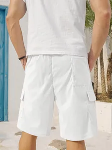 Back view of men's premium white corduroy cargo shorts featuring multiple utility pockets