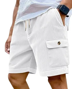 Detailed view of white corduroy cargo shorts showing side pocket and drawstring waist