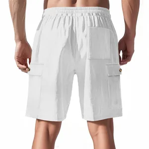 Detailed rear view of men's white corduroy cargo shorts featuring multiple utility pockets