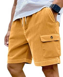 Detailed view of men's mustard corduroy cargo shorts showing fabric texture and pocket.