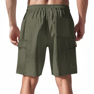 Back view of olive green corduroy cargo shorts with multiple utility pockets for men