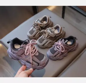 Close-up of breathable mesh chunky dad sneakers for girls in trendy purple and beige