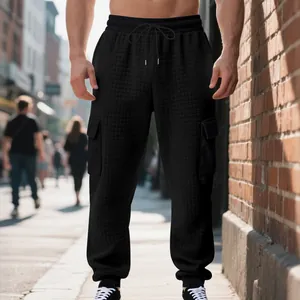 Pantalon cargo épais pour hommes avec motif gaufre noir et cordon de serrage réglable