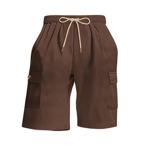 Detail view of brown corduroy cargo shorts for men featuring elastic drawstring waist