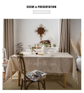 European style minimalist linen tablecloth with tassels shown in a dining room scene