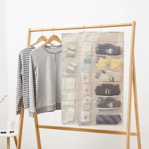 Hanging fabric organizer bags for socks and accessories shown in a home closet setting