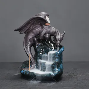 Ceramic backflow incense burner with detailed dragon and blue glazed waterfall design