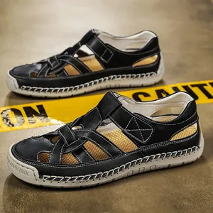 Black Roman-style woven flat sandals with white soft soles and hand-stitched detailing