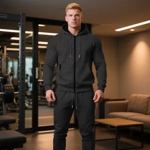 Vista de cuerpo completo de chándal gris oscuro con capucha y cremallera para hombre