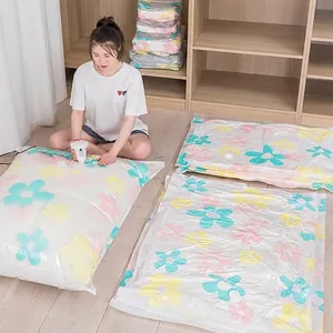Space-saving vacuum storage bags with colorful sunflower pattern and manual air pump