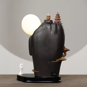 Zen-style Dehua ceramic mountain backflow incense burner with glowing moon night light