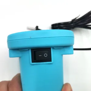 Blue electric vacuum pump for storage bags showing the power switch details
