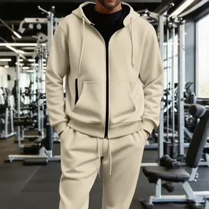 Conjunto de sudadera beige con cremallera y pantalón deportivo para hombre