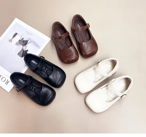 Selection of girls' Mary Jane leather shoes in brown, black, and beige