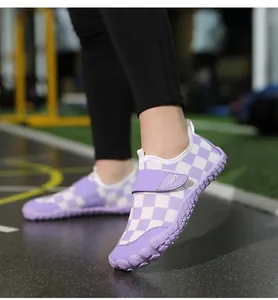 Close-up of kids' purple checkered water shoes with non-slip soft rubber soles