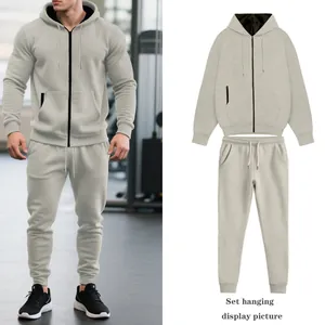 Conjunto gris de sudadera con capucha y pantalón para hombre en modelo y plano.