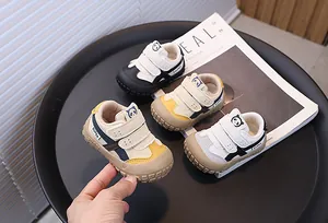Detailed view of baby walking shoes with anti-kick rubber toes and cute panda prints