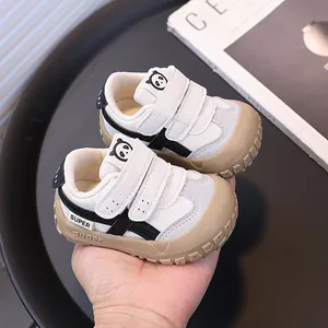 Casual white and beige baby sports shoes featuring anti-kick toe caps and cute panda design