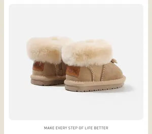 Detailed back view of kids tan sheepskin winter snow boots with thick plush fur trim