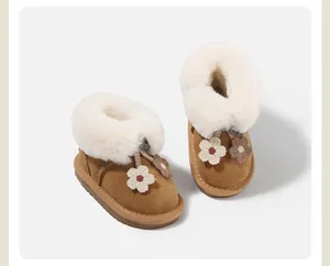 Warm toddler snow boots featuring plush white faux fur collar and cute flower accents