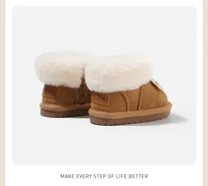 Detailed back view of brown toddler snow boots with warm plush white faux fur lining