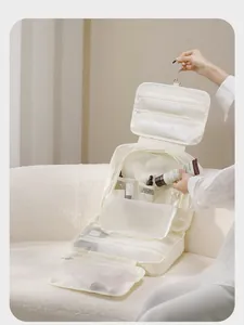 Detailed view of the large capacity Taslon hanging toiletry bag with multiple compartments