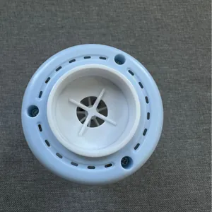 Blue wireless electric vacuum pump for household storage bags, top view of intake