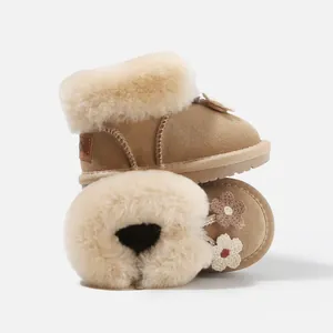 Warm girls winter snow boots featuring soft fleece lining and decorative crochet flowers
