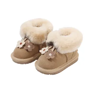 Stylish brown toddler girls' winter snow boots with warm plush lining and flower decor